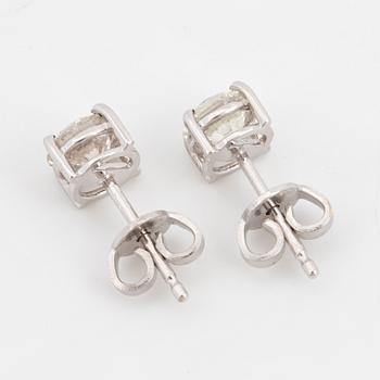 Brilliant-cut diamond stud earrings, with IGI report.