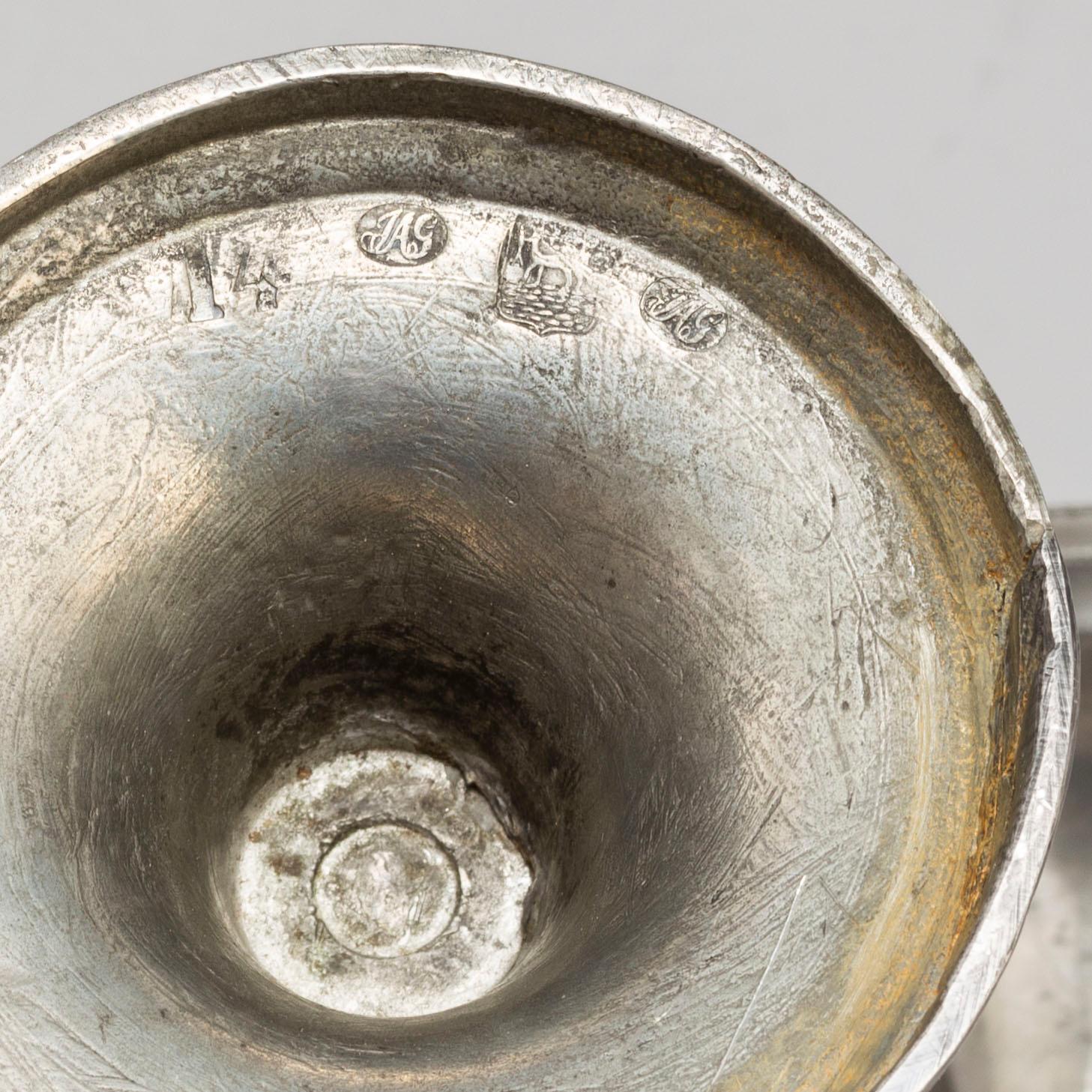 Two pair of Swedish pewter candlesticks, early 19th century and ca 1900.