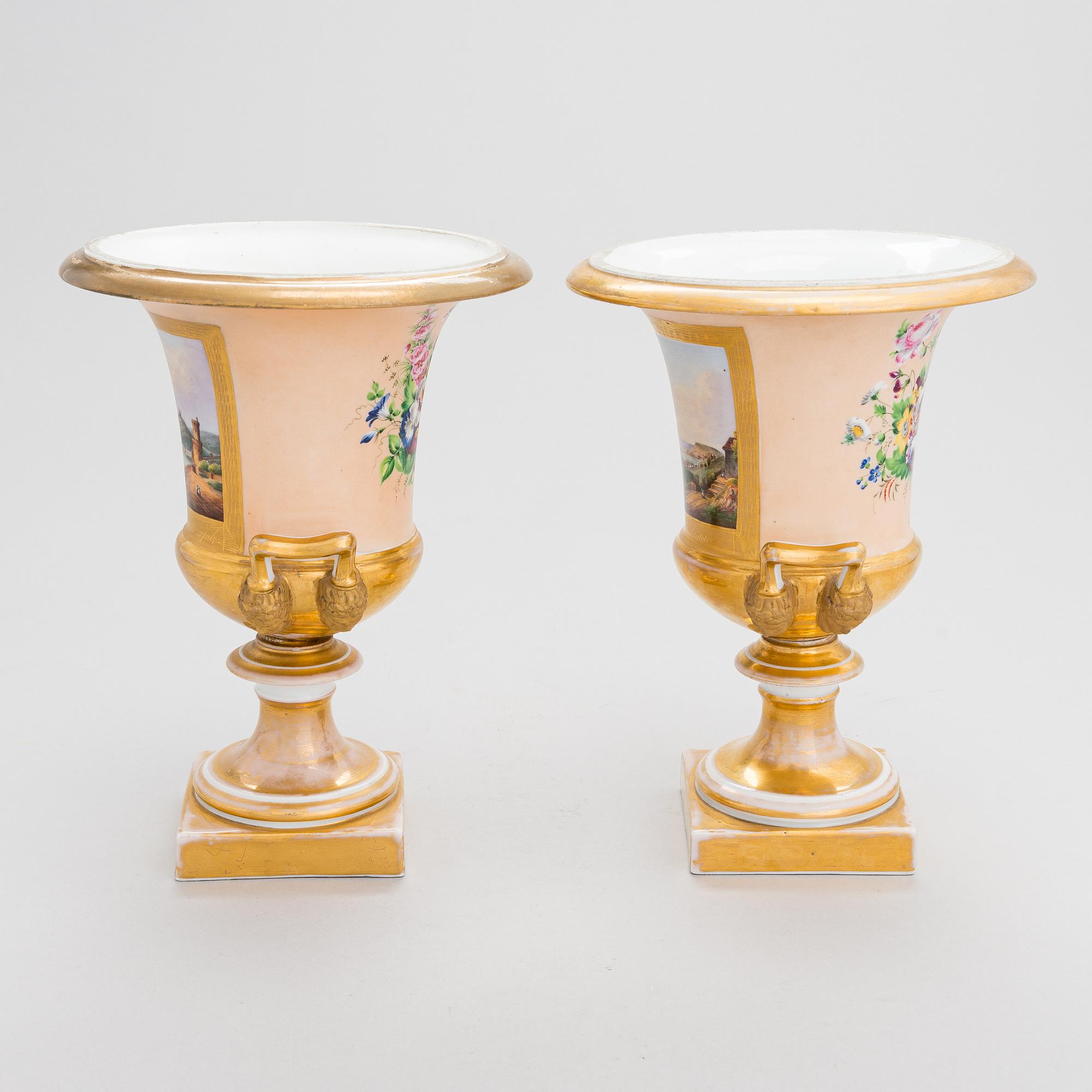 A pair of German porcelain urns from around the mid-19th century.