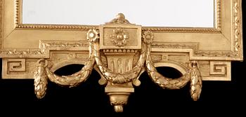 A Gustavian mirror dated 1777.