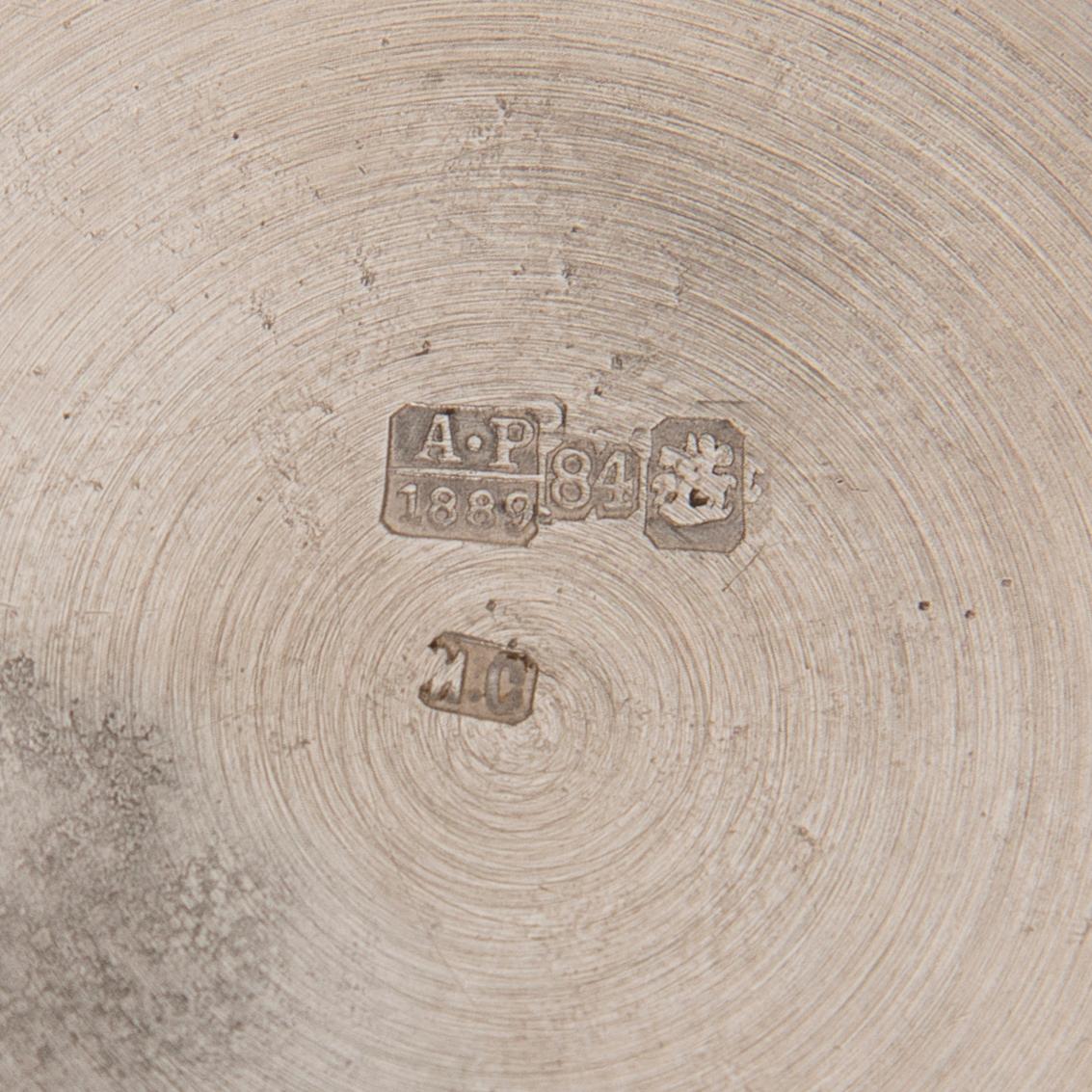 Two tea glass holders in silver, one with mark of Ivan Saltykov, Moscow 1889, the other one marked Moscow 1908-1917.