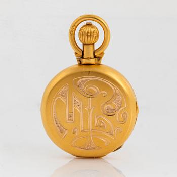 A 14K engraved gold locket.