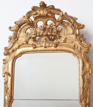 A Swedish Rococo mirror by Nils Sundström (master in Stockholm from 1757), dated 1770.