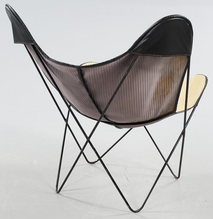 A chair, so called bat chair, made in the mid 20th century.