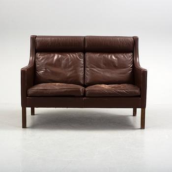 A two-seat leather sofa by Børge Mogensen for Fredrika Stolefabrik, Denmark.