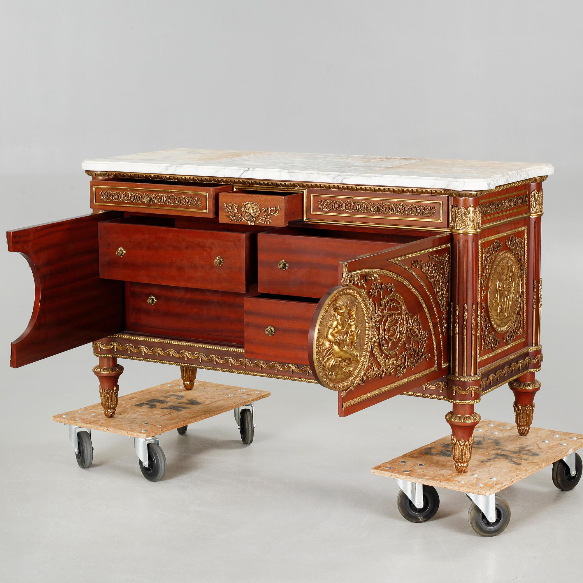 A Louis XVI style chest of drawers, second half of the 20th century.