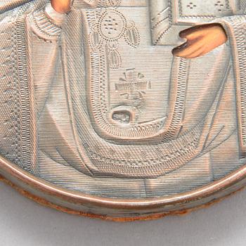 Three early 20th-century Russian travelling icons.