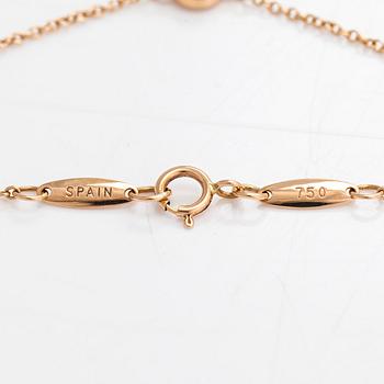 Tiffany & Co, Elsa Peretti, an 18K gold bracelet with a brilliant cut diamond ca 0.07 ct.