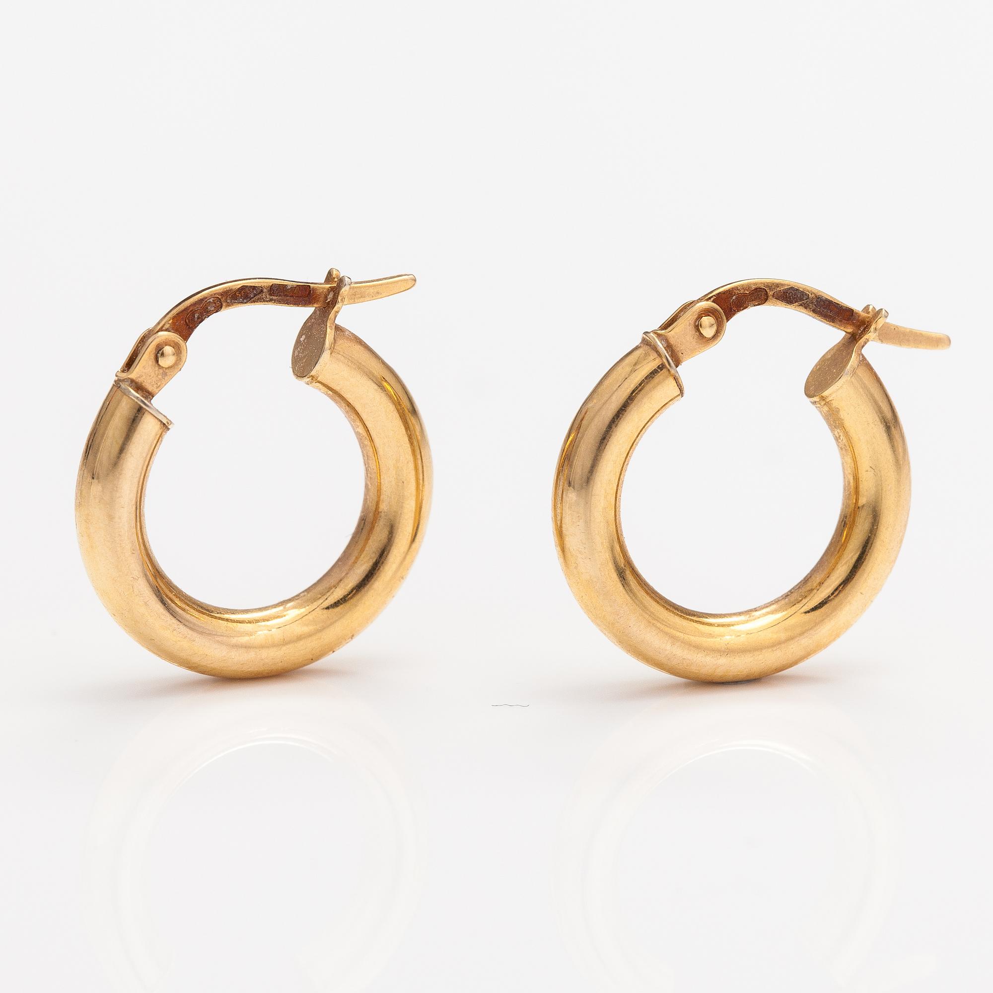 A pair of 14K gold earrings. Italy.