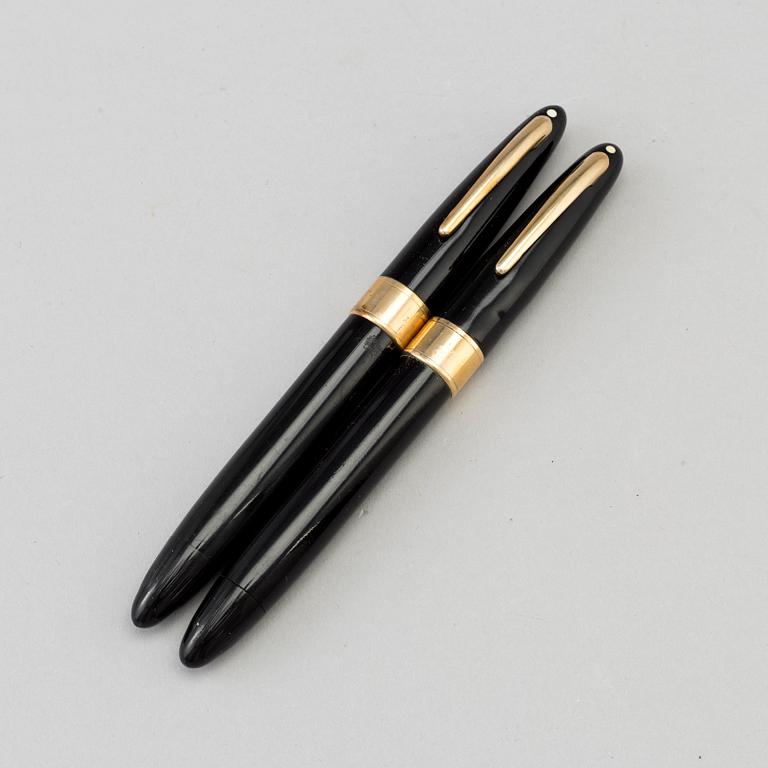 TWO SHAEFFER PEN CO FOUNTAIN PENS, first half of the 20th century.