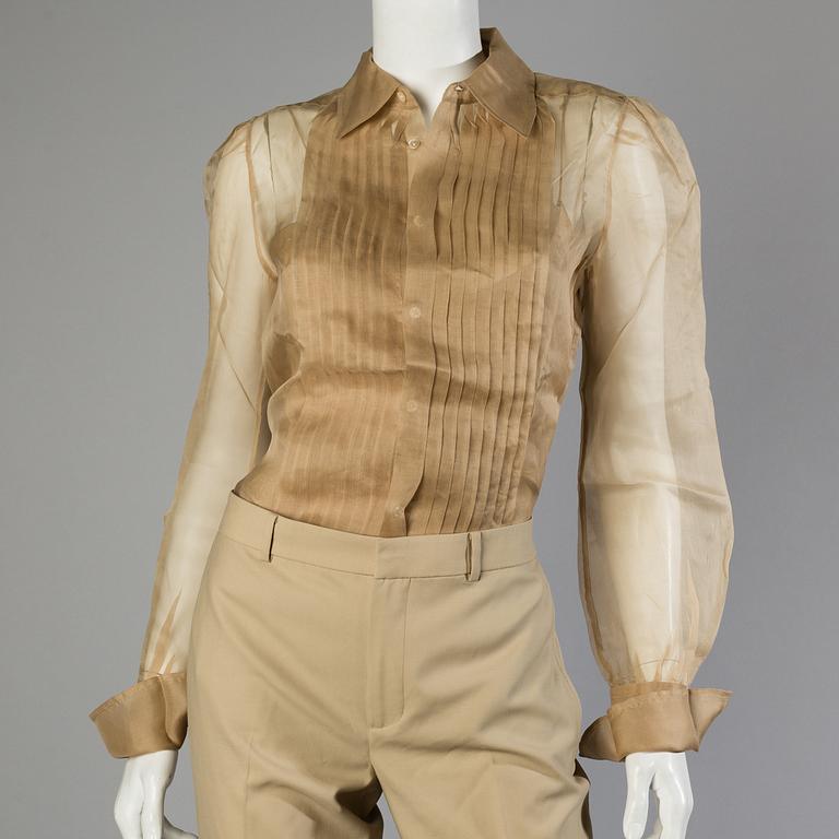 Trousers, shirt and west by Ralph Lauren.