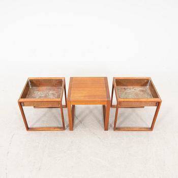 A set of two 1960s teak and copper flower tables and one teak side table.