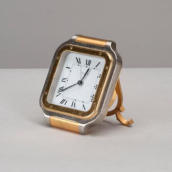 A CARTIER TABLE CLOCK, steel with gidt decoration, late 20th century.