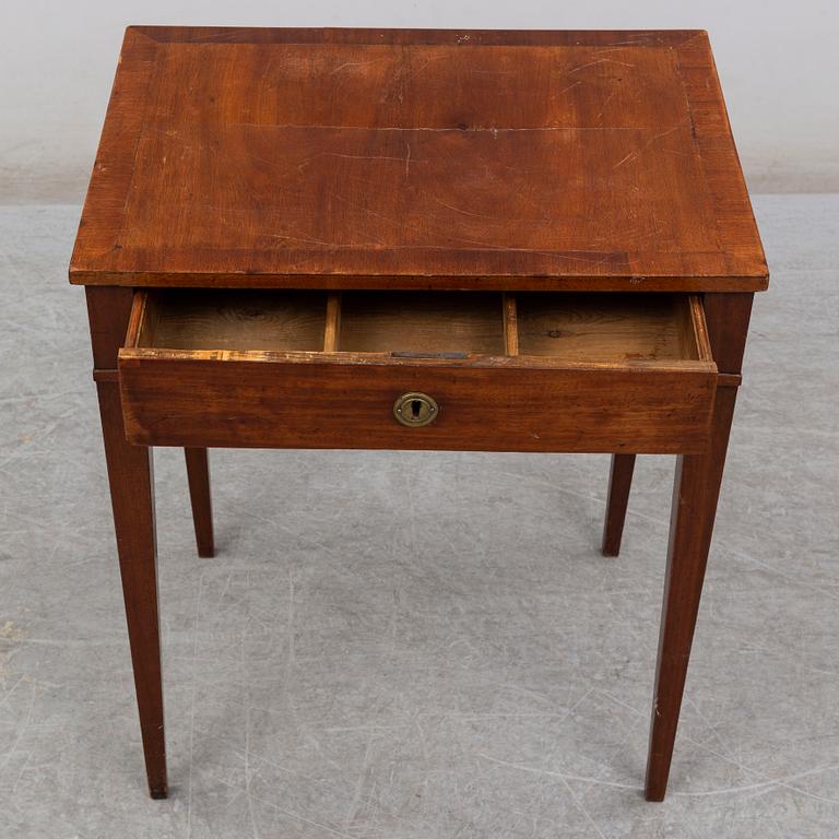 A late gustavian sewing table, ca 1800.