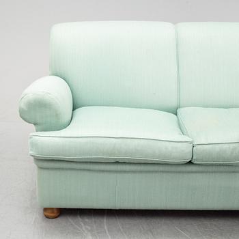 A model 703 sofa by Josef Frank for Firma Svenskt Tenn.