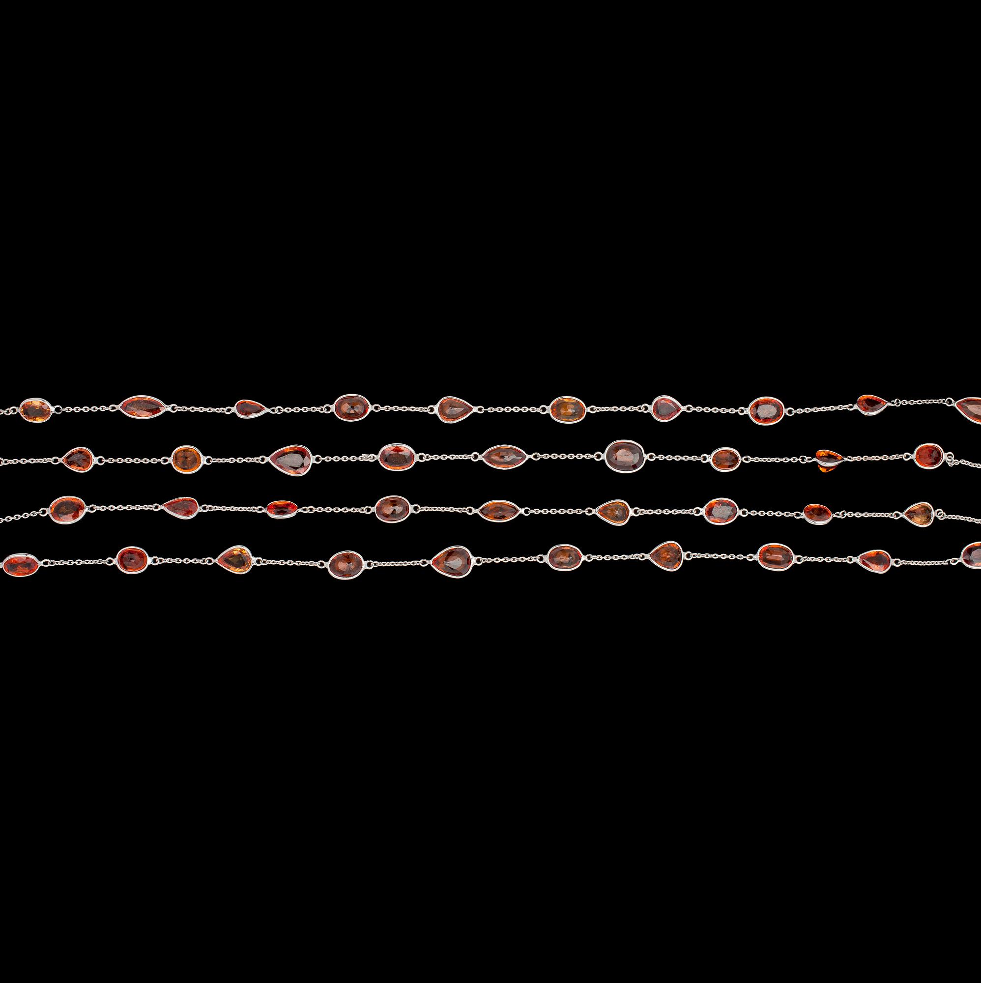 COLLIER, ovala fasettslipade oranga safirer, tot. 44 ct.