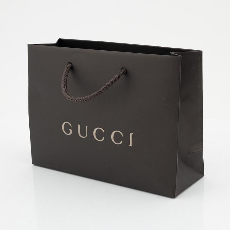Gucci, a wool blend hat, size L.