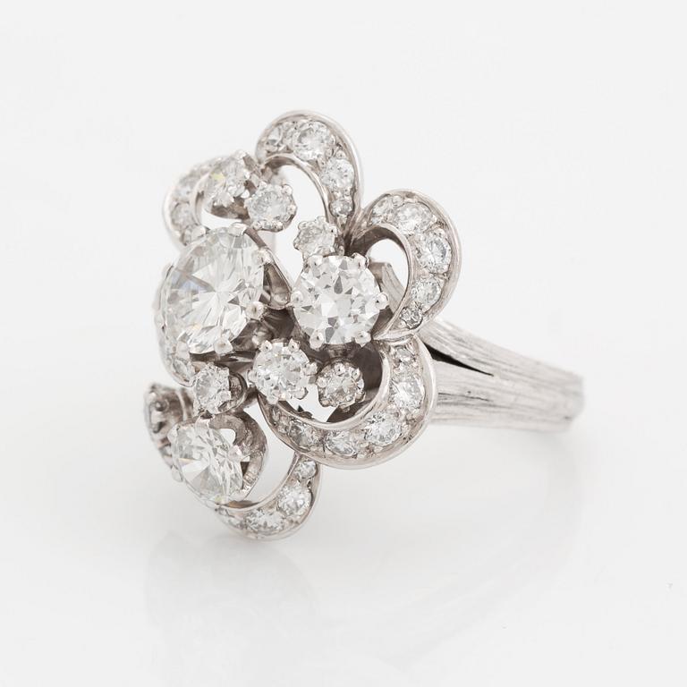 An 18K white gold WA Bolin ring set with round brilliant-cut diamonds.