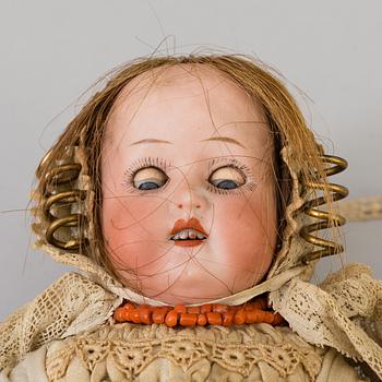 a HEUBACH KÖPPELSDORF porcelain doll, Germany in the first half of the 20th century.