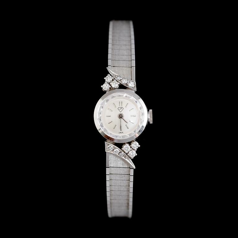 DAMARMBANDSUR, 18 k vitguld, briljantslipade diamanter tot ca 0.30 ct.