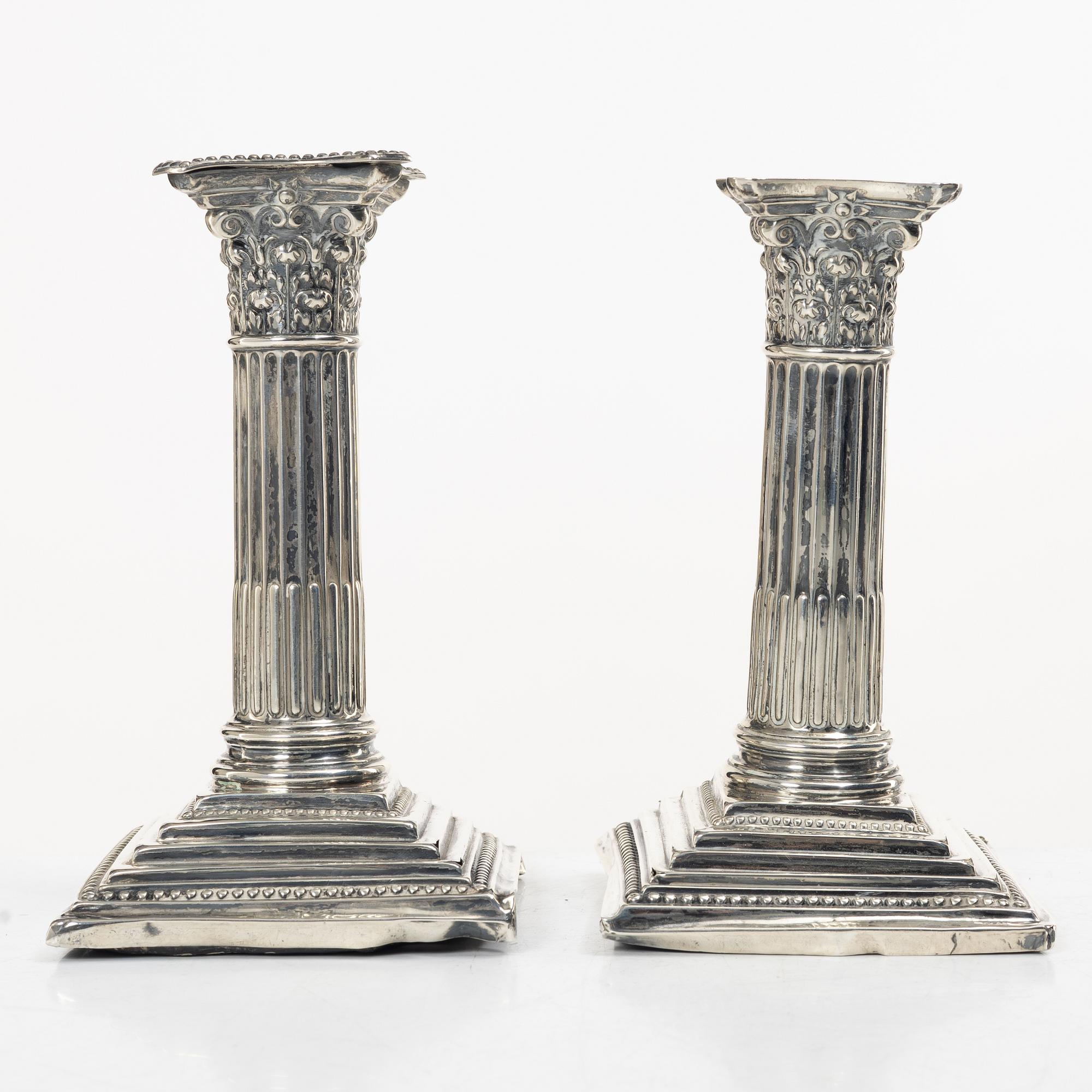 A pair of English silver column candlesticks, mark of Walter Latham & Son, Sheffield, 1910.