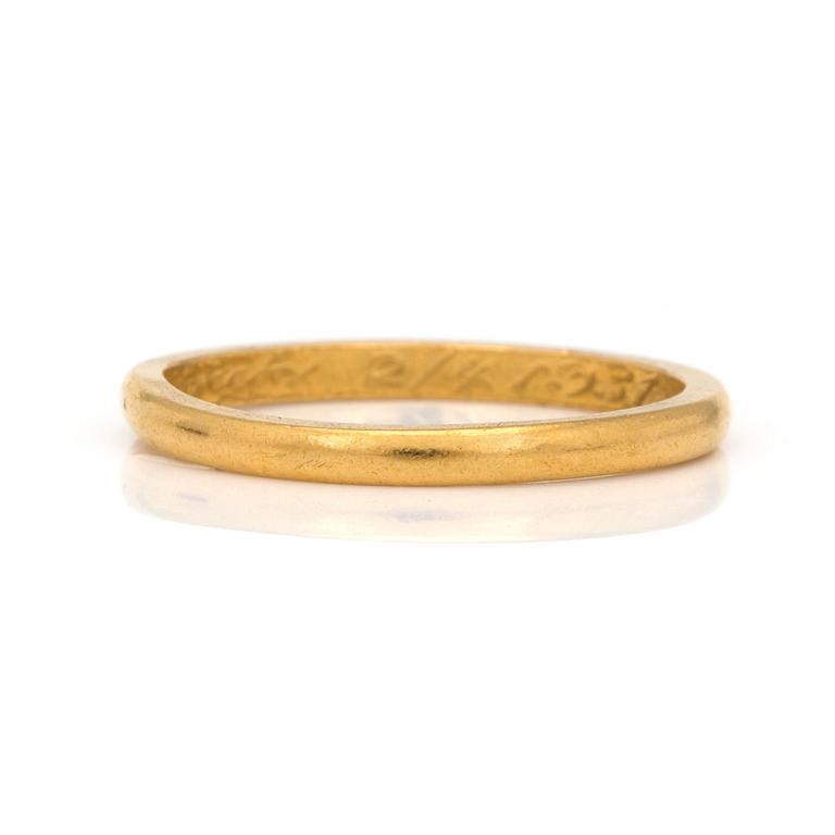 A 23K gold ring.