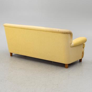 Josef Frank, a model 678 sofa, Firma Svenskt Tenn, Sweden.