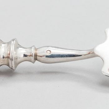 Four pieces of Russian silver cutlery.