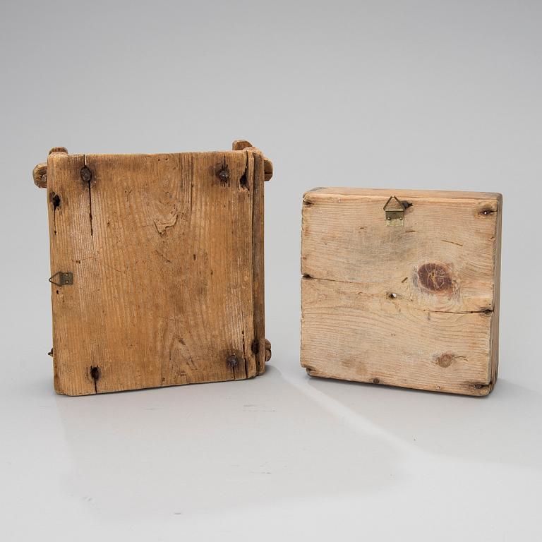 Two Finnish 18th/19th century wooden cheese moulds.