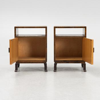 A pair of 1930's bedside tables.