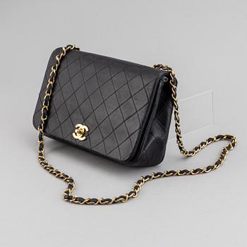 Chanel, a quilted leather 'Flap' bag, 1989-91.