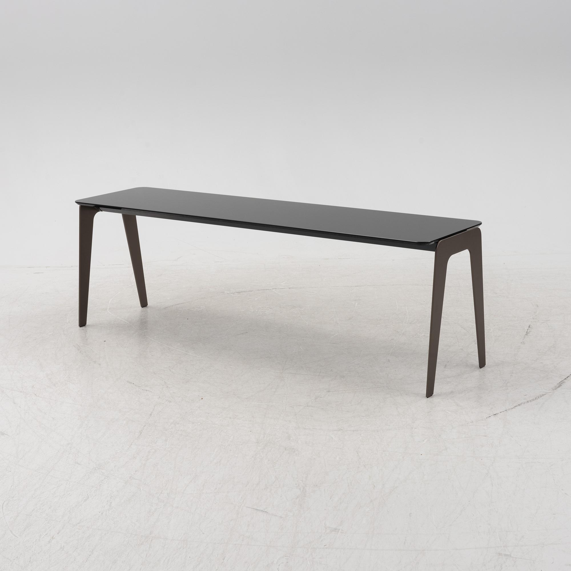 A 'Kirk' glass table by Rodolfo Dordoni for Minotti. 21st Century.