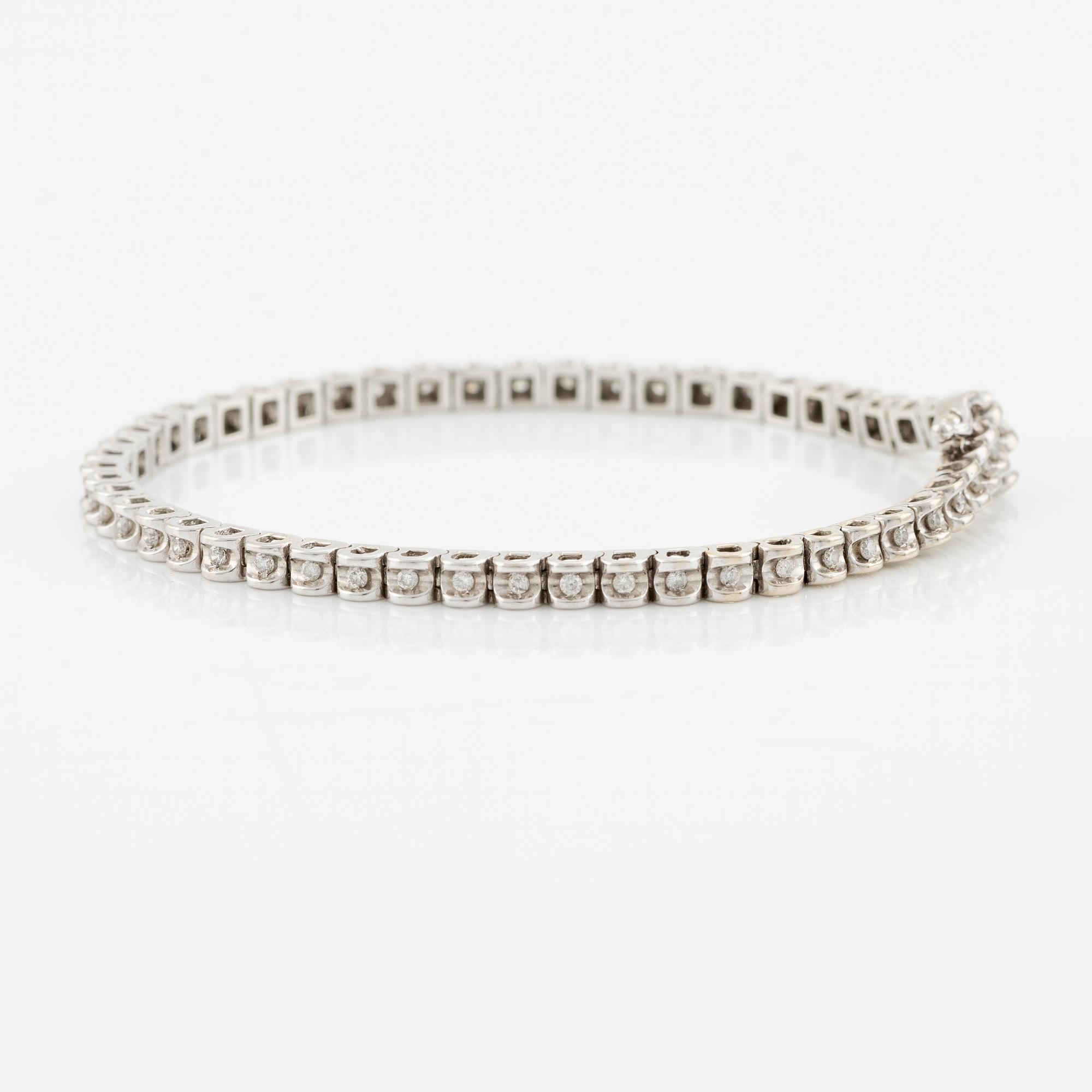 Tennis bracelet, 14K white gold and brilliant-cut diamonds.