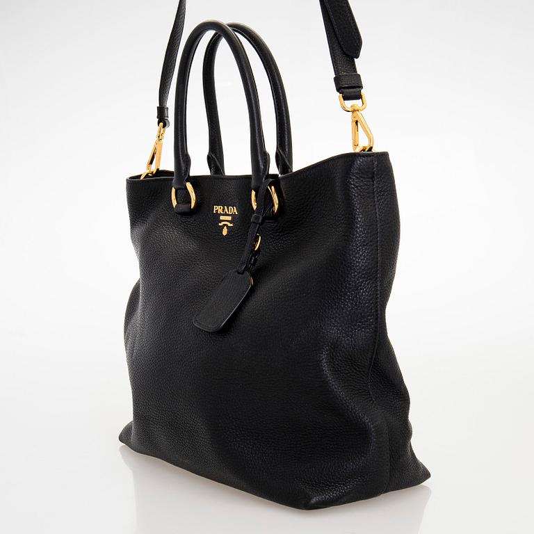 Prada, A 'Vitello Daino Tote' bag.