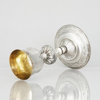 An 18th century parcel-gilt silver cup and paten, unmarked.