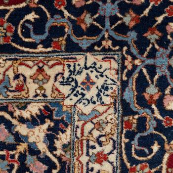 A semi-antique Benlian Tabriz carpet, signed Jabarzade, c. 416 x 308 cm.