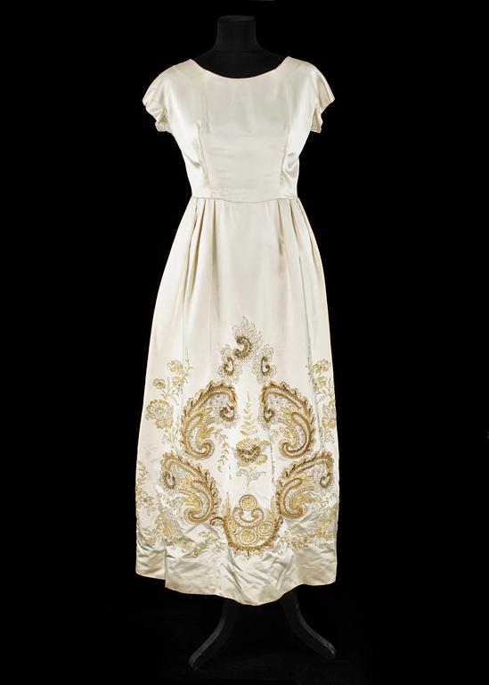 A cream colored silk wedding dress/evening dress by Mea.