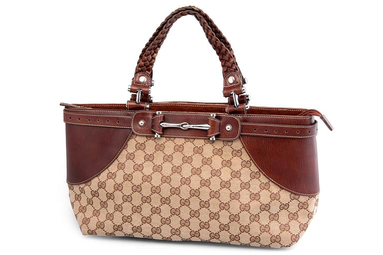 A HANDBAG, Gucci.