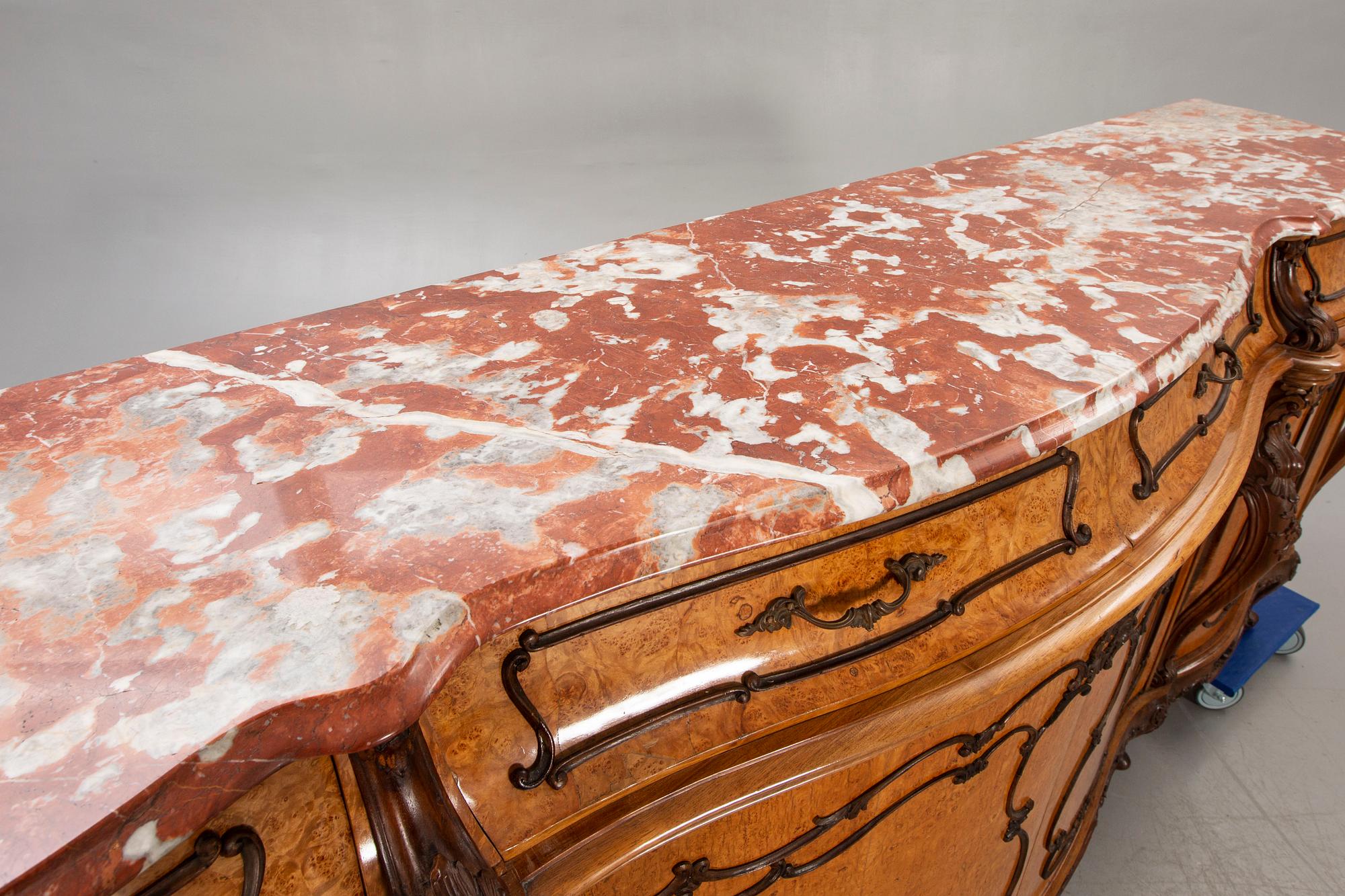 A Louis XV style birch sideboard first half of the 20th century.