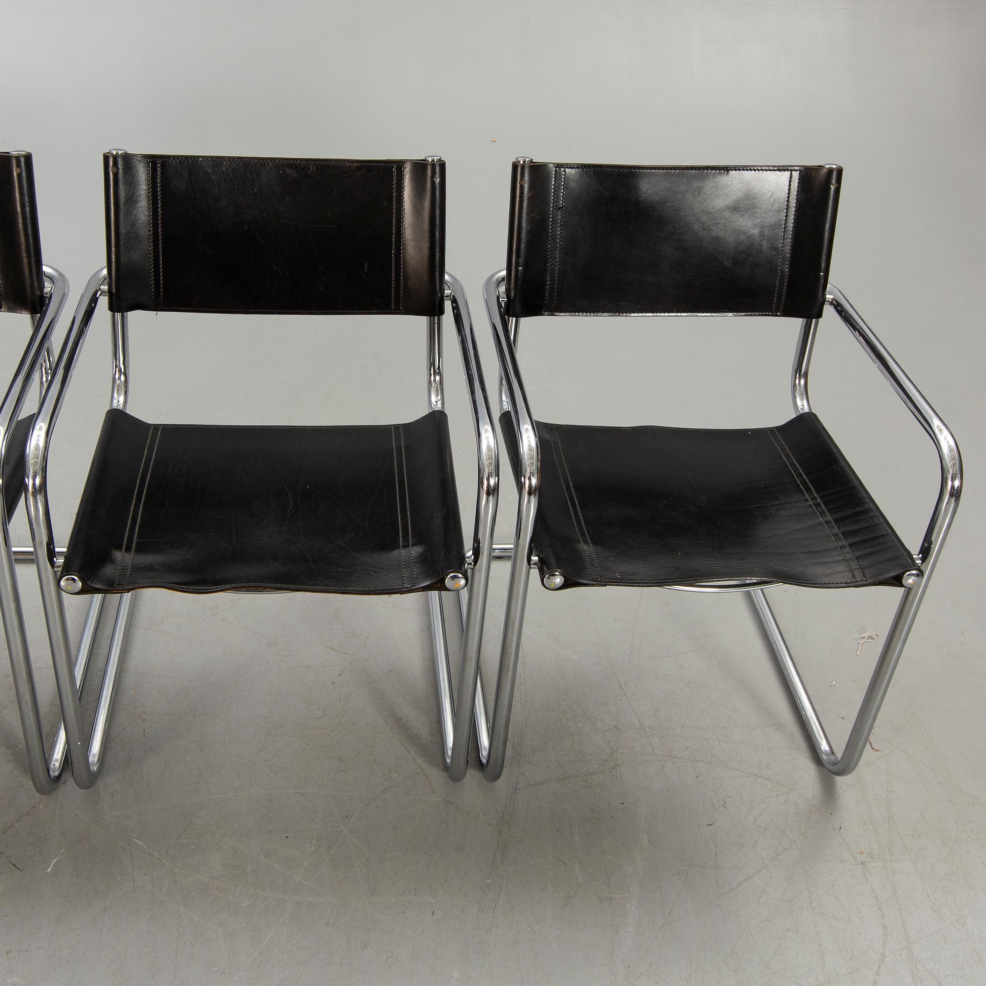 A set of four Italian chrome and leather chairs later part of the 20th century.