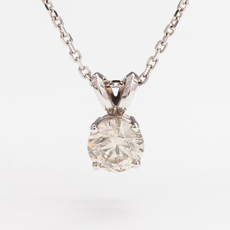 A 14K white gold necklace with a ca. 0.93 ct diamond.