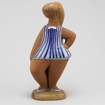 LISA LARSON, a 'Dora' stoneware figurine, from ABC-Flickorna, Gustavsberg.