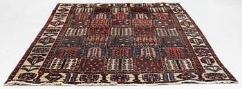 An oriental carpet, c. 290 x 200 cm.