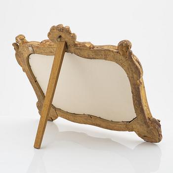 A gesso Louis XV-style toilette mirror, 20th Century.