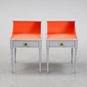A pair of 20th Century bedside tables.