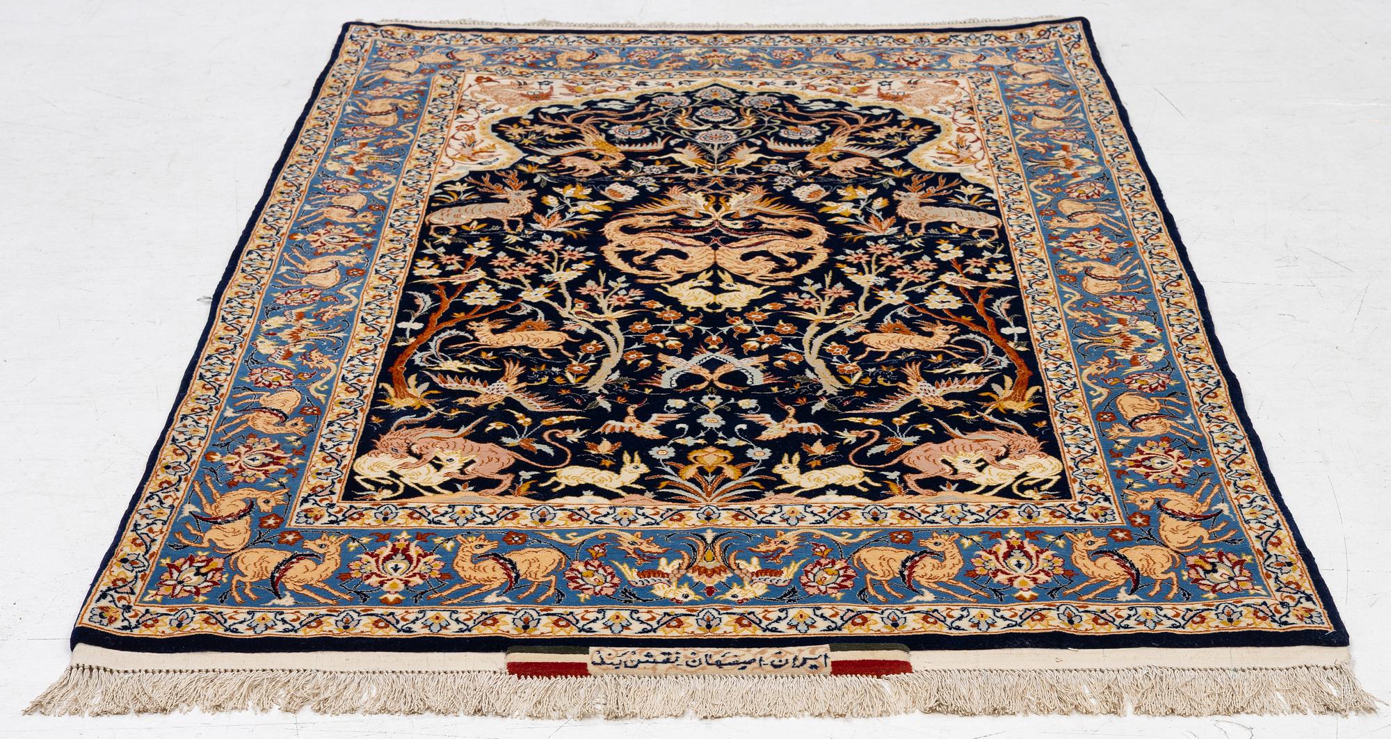 A semi-antique part silk Isfahan, signed, c. 176 x 107 cm.