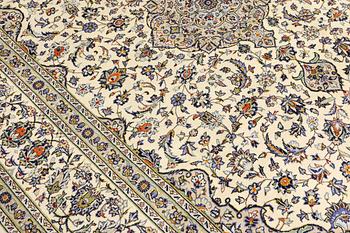 A Keshan carpet, 355 x 260 cm.