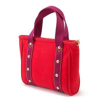 Handbag by Louis Vuitton.