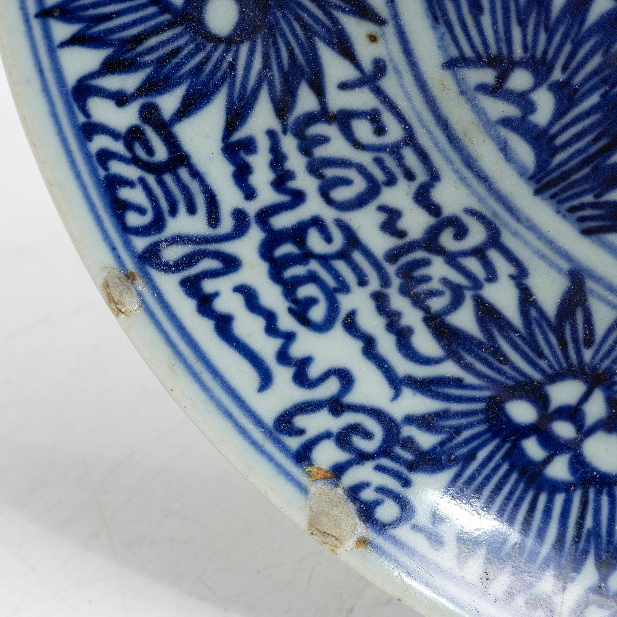 Two similar blue and white porcelain plates, 19th century.