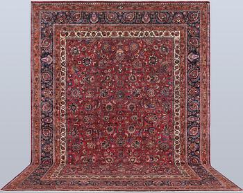 A semi-antique Meshad carpet, signed 'Saber', approx. 459 x 348 cm.